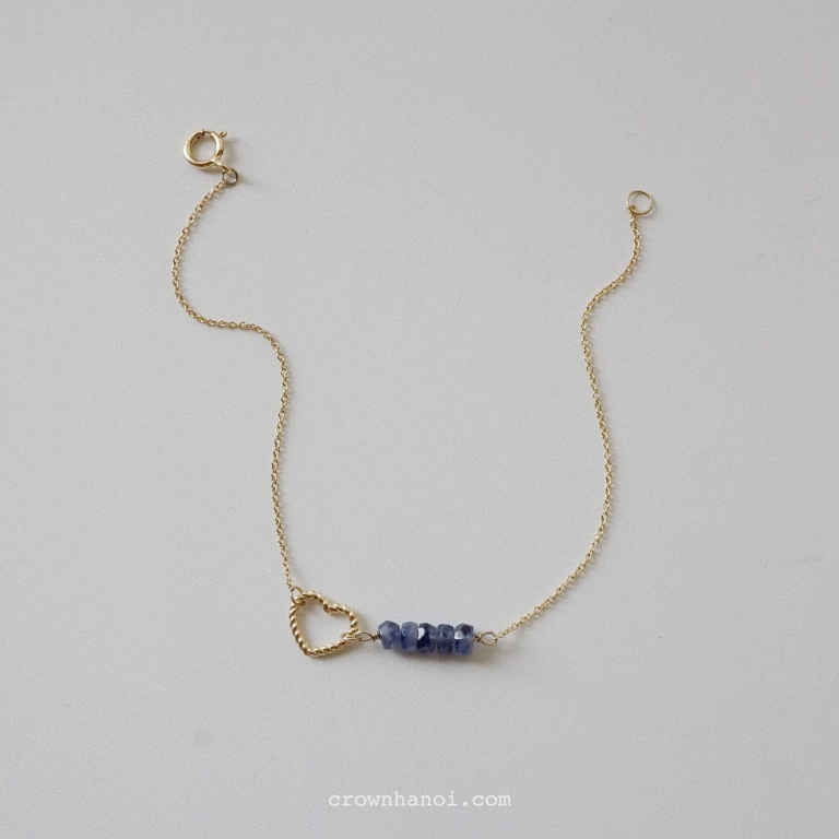 BLUE SAPPHIRE TWIST HEART BRACELET