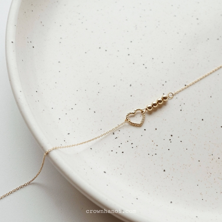 BEADED TWIST HEART BRACELET