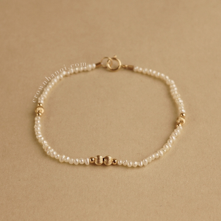 ORBIT BABY PEARL BRACELET