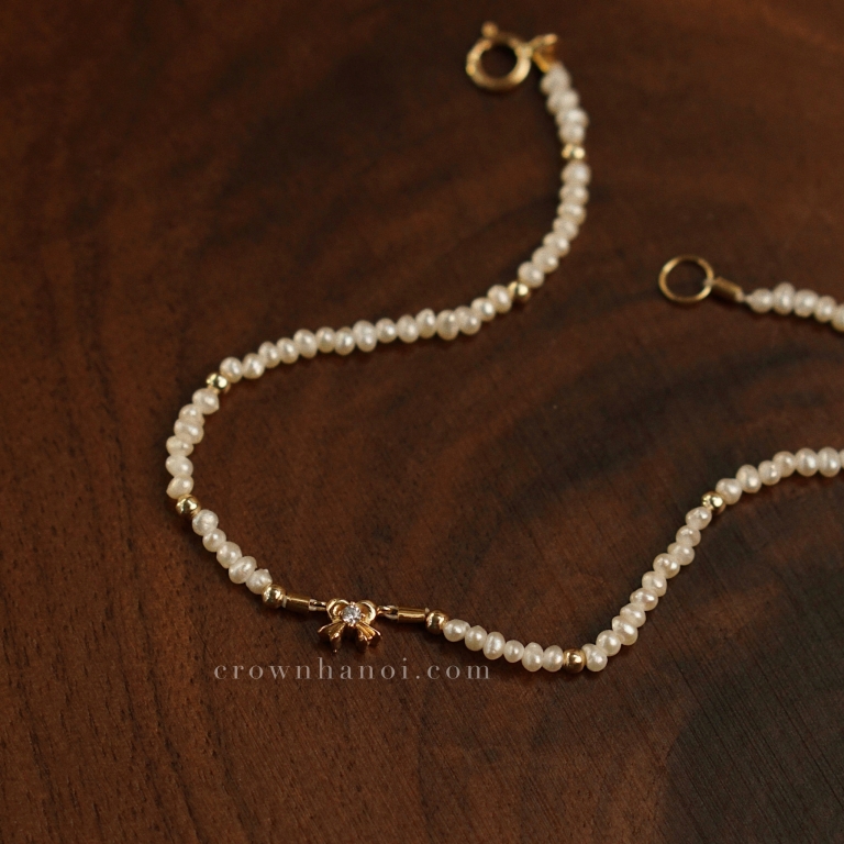 RIBBON BABY PEARL BRACELET