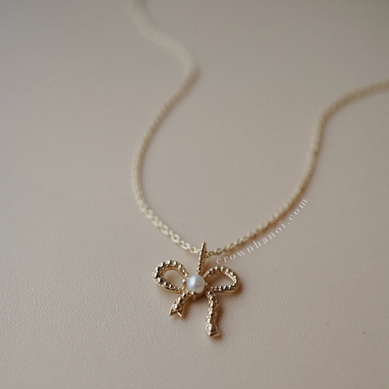 RIBBON PEARL NECKLACE