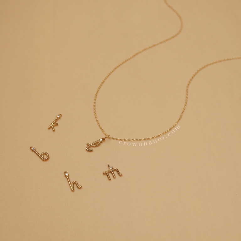 TWIST LOWERCASE LETTER NECKLACE